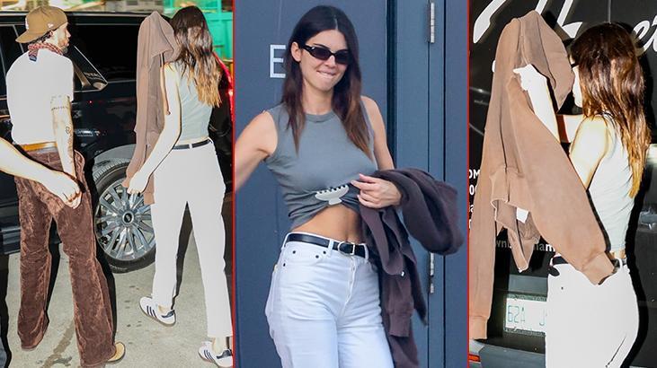 Ünlü çift kameralardan kaçmaya devam ediyor! Fotoğrafçıları görünce ceketini kafasına geçirdi