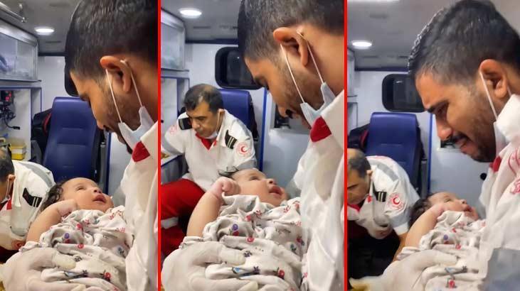 Yaralı bebeği güldürmek isteyen sağlıkçı gözyaşlarına boğuldu