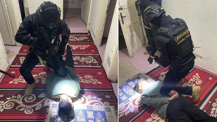 Teröristbaşının fotoğrafını köprüye asan 2 kişi yakalandı